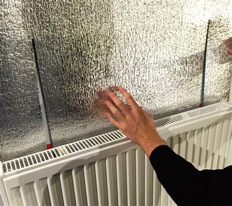 metal sheet behind radiator|reflective insulation behind radiators.